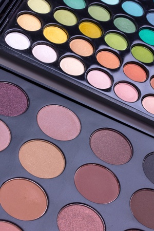 Neutral and multicolour eyeshadows palettes, closed-upの写真素材