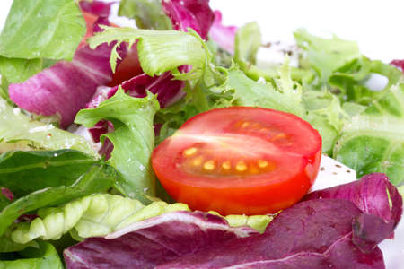 Tomoto in fresh salad, closed-upの写真素材