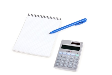 Calculator and paper notebook with blue pen, closed-up on whiteの写真素材