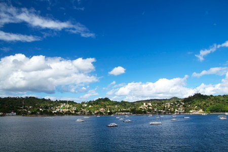 Atlantic ocean with yachts in a bay, island Samana, Dominican Republicの写真素材