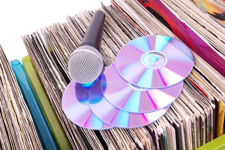 Microphone and compact disks on records, closeupの写真素材
