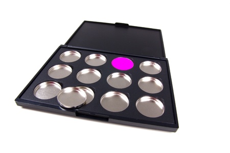 Magnetic palettes for eyeshadows, closeup on whiteの写真素材
