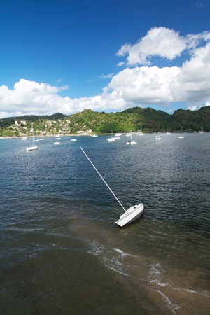 Broken yacht in a bay, island Samana, Dominican Republic の写真素材
