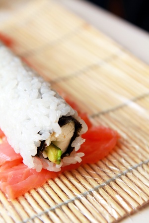 Philadelphia  roll on wooden mat, closeupの写真素材