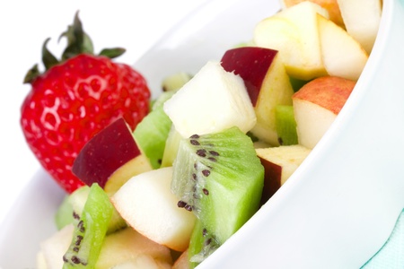 Fruit salad in white plate, closeupの写真素材
