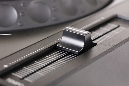Pitch on Dj cd player, closeup on whiteの写真素材