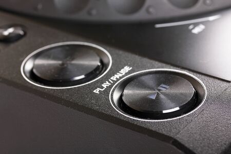 Play and stop buttons on Dj cd player, closeup の写真素材