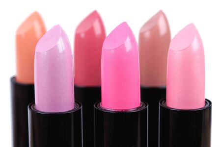 Align lipsticks different colours, closeup on whiteの写真素材