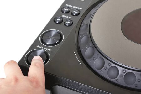 Finger on button of dj cd player, closeupの写真素材