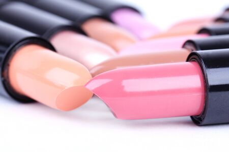 Align lipsticks closeup on whiteの写真素材