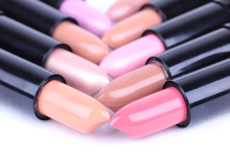 Align lipsticks closeup on whiteの写真素材