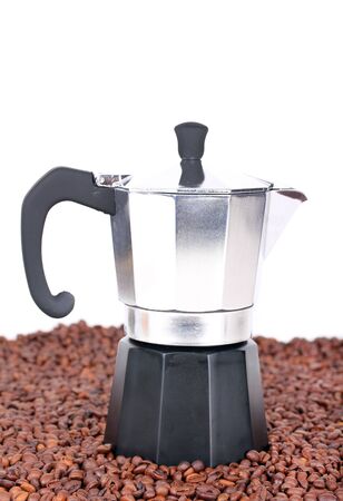 Coffeepot on coffee beans, closeupの写真素材