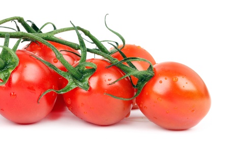 Raw tomato cherry, closeup on whiteの写真素材