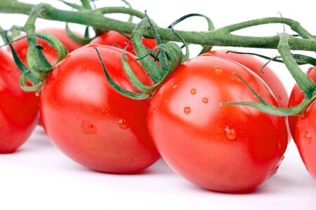 Tomato cherry, closeup on whiteの写真素材