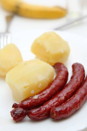 Sausages and potatoes, closeup の写真素材