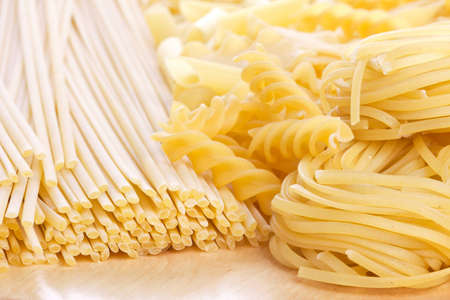Tagliatelle, spirals and spaghetti, closeup shotの写真素材