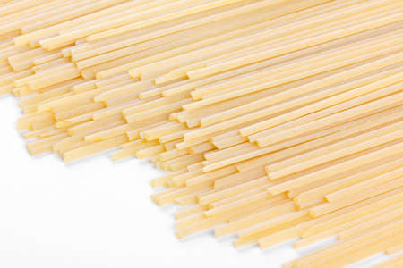 Spaghetti closeup on white backgroundの写真素材