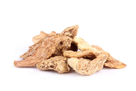 Ginger, ingredient for preparation mulled wine, closeup on whiteの写真素材