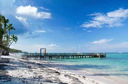 Wooden pier on tropical beach, Caribbeanの写真素材