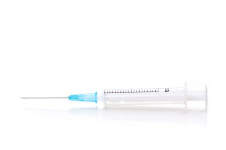 Syringe closeup on white の写真素材