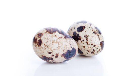 Quail eggs, closeup on white backgroundの写真素材