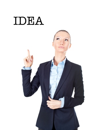 Business woman pointing up on sign ideaの写真素材