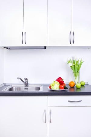 Vegan food in white kitchen interiorの写真素材