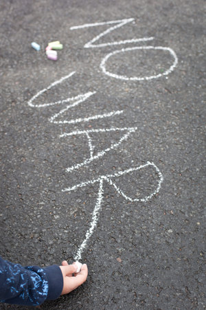 Child handwriting by chalk - NO WAR