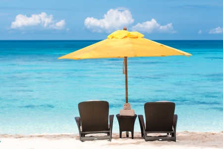 Sun umbrella and beach chairs on tropical beach, Philippines, Boracayの写真素材