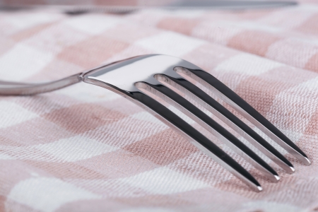 Fork on towel, closeupの写真素材