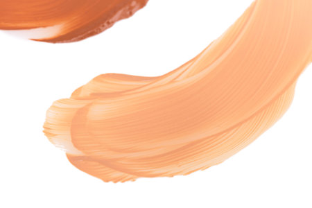 Samples of make-up foundation closeup on white