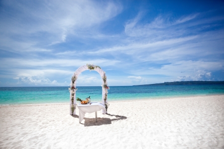 Beautiful wedding arch on tropical beach, nobody. Travel weddingの写真素材