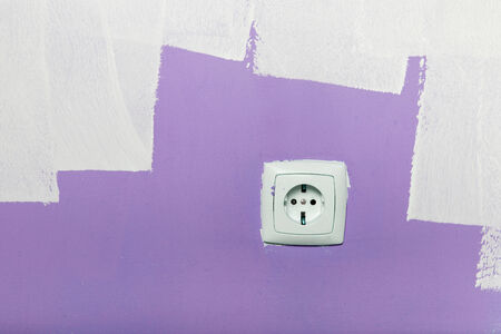 Electrical outlet on wall, interior の写真素材