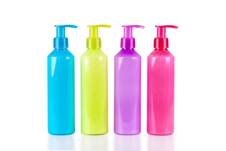 Multicoloured neon lotion bottles with dispenser pumpの写真素材
