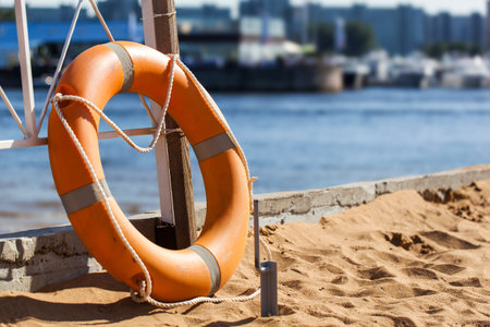 Lifebuoy on beach, closeup