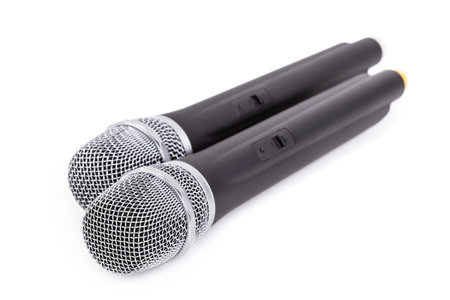 Cordless microphone closeup on white backgroundの写真素材