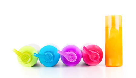 Multicoloured neon lotion bottles with dispenser pumpの写真素材