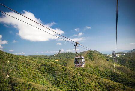 Cable Car way to mountains with statue of buddha, Hong Kongのeditorial素材