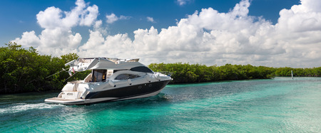 Luxury private motor yacht sailing out at seaの写真素材