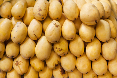 Background of mango fruit on asian market, shallow dept of field