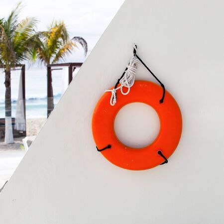 Lifebuoy ring near swimming pool at luxury resortの写真素材