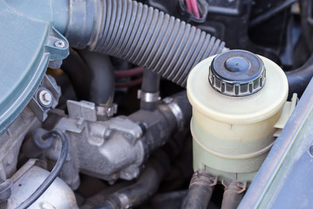 Closeup parts of  car engine. Checking antifreezeの写真素材