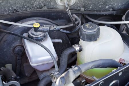 Closeup parts of  car engine. Checking antifreezeの写真素材