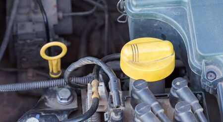 Closeup parts of  car engine. Checking oilの写真素材