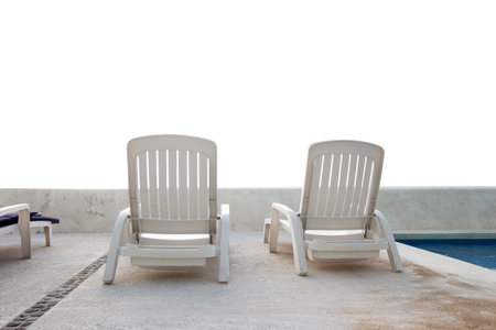 Beach beds at luxury resort with white background