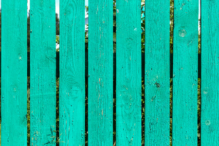 Old green wooden fence backgroundの写真素材