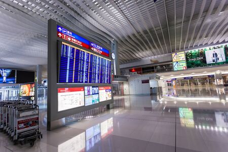 HONG KONG, INTERNATIONAL AIRPORT - 26 OCTOBER 2012: Airport timetable board in airport terminalのeditorial素材