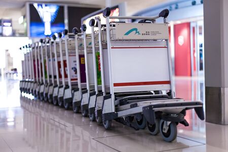 Hong Kong International Airport - 16 October 2012: Luggage Carts inside Airportのeditorial素材