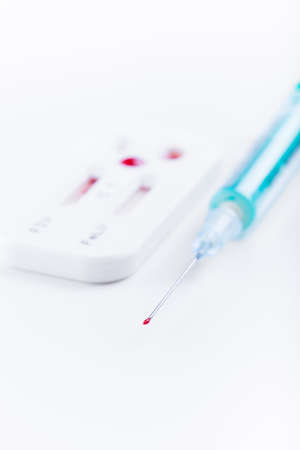 Blood testing virus kit on white. Healthy care conceptの写真素材