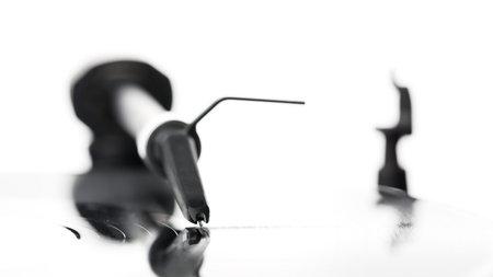 DJ needle on spinning turntableの写真素材